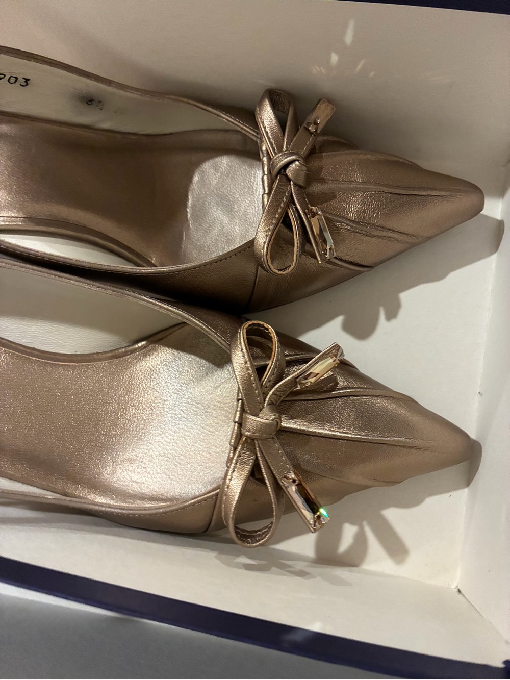 Stewart Weitzman Women's Pointed Bow-Accent Shors in Metallic Gold